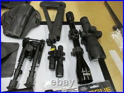 Box of Misc rifle slings, holsters, and scopes etc